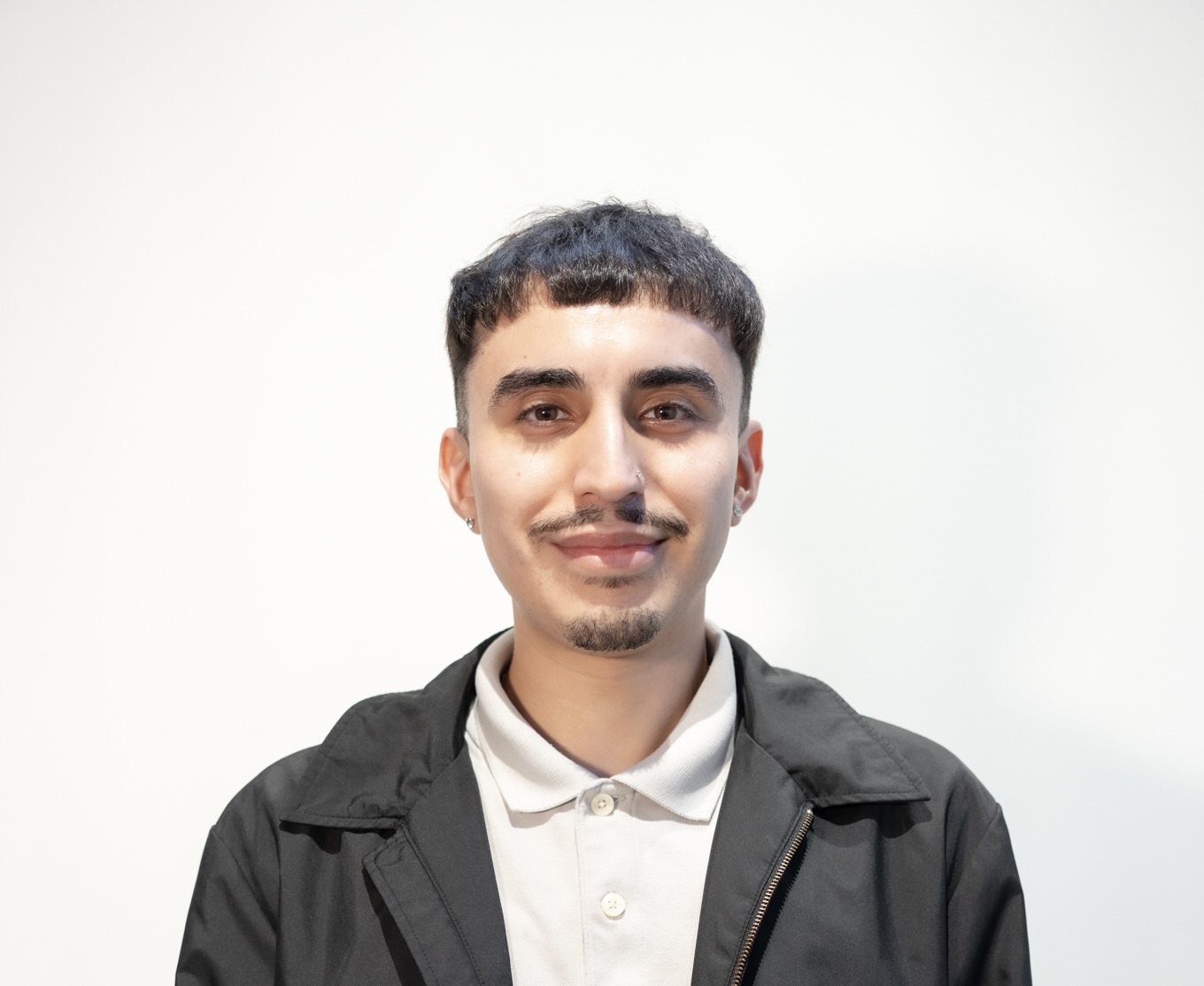 A picture of me wearing a brown coat