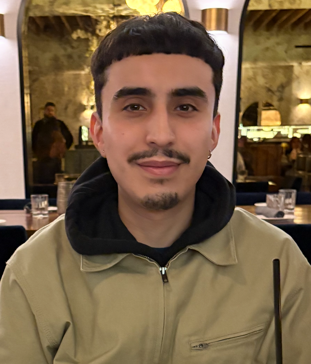 A picture of me wearing a brown coat